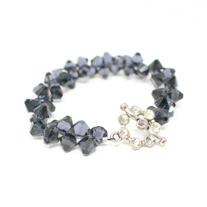 Blue-grey stone bracelet with delicate crystal clasp.